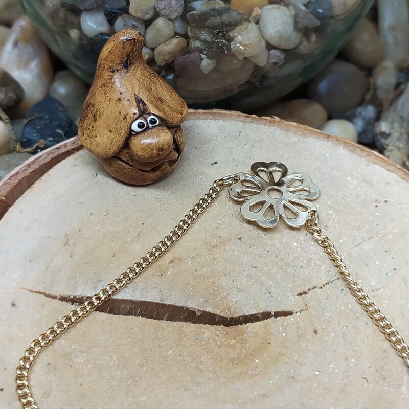 bracelet fleur ajourée plaqué or
